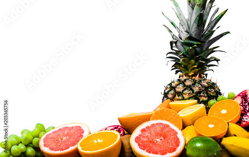 Fototapeta Naklejka Na Ścianę i Meble -  Tropical fruits on white background, pile of fresh fruit assortment