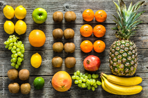 Tropical fruit mix on table. Fruits as healthy clean eating and dieting concept.