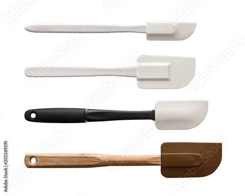 Isolated kitchenware wooden and plastic rubber scraper set for baker