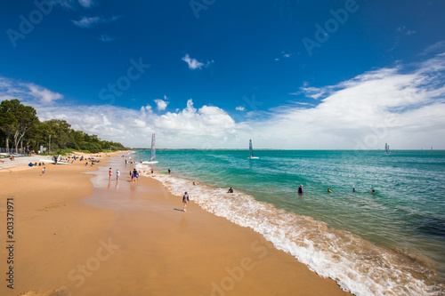 HERVEY BAY, AUS - APRIL 1 2018: People enjoying nice summer day on a beach in Hervey Bey, Australia