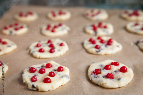 Preparing homemade cookies with guelder rose berries