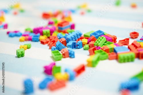 colorful bricks toy on mat floor for playing