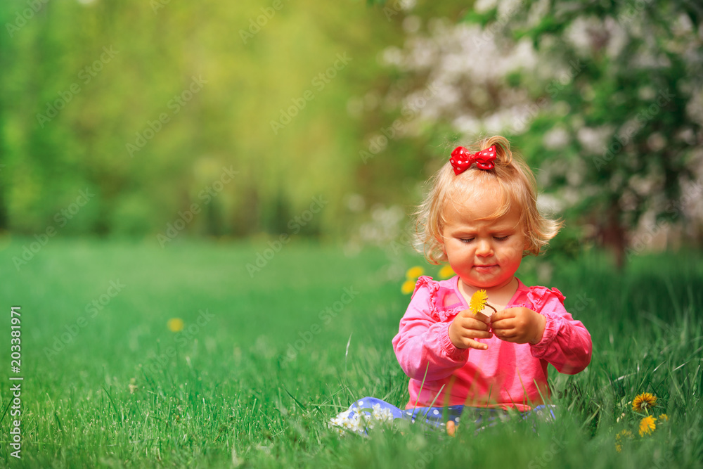 cute little girl with flowers in spring nature cute little girl with flowers in spring nature