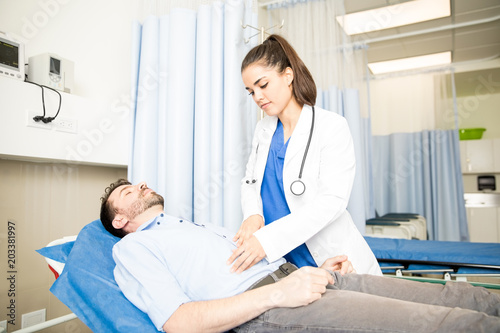 Doctor doing checkup of a patient