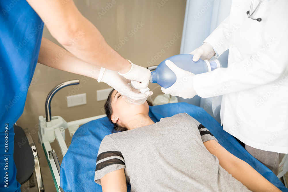 CPR treatment on female patient