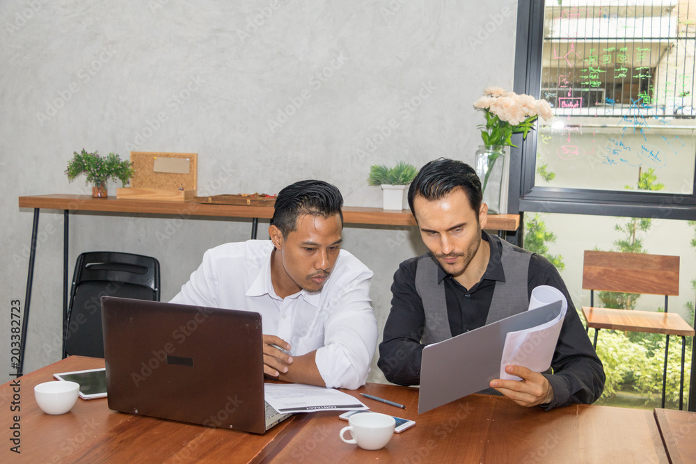 Two men are discussing a job Two men are discussing a job