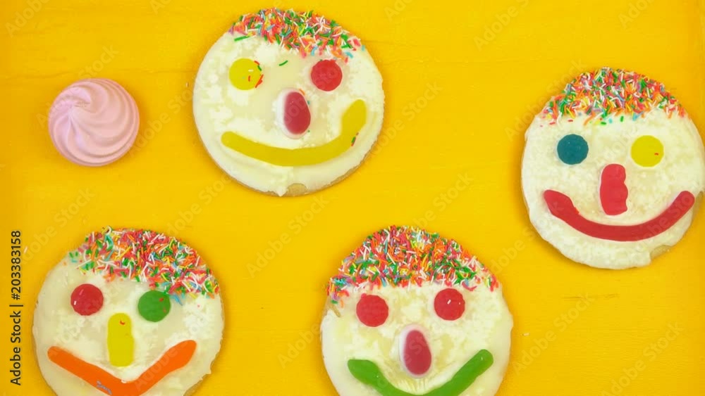 Pop Art Color style donuts and bakery goodies on bright colorful background, overhead time lapse. Pop Art Color style donuts and bakery goodies on bright colorful background, overhead time lapse.