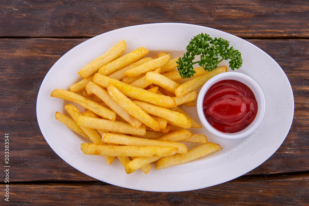 Fried French fries with fennel and ketchup
Fried French fries with fennel and ketchup