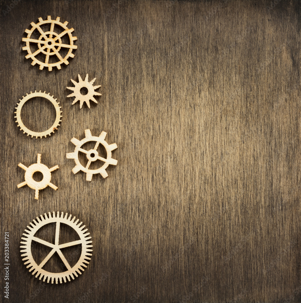 gear tools at wooden background
