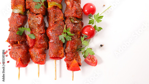beef skewer marinated on white background