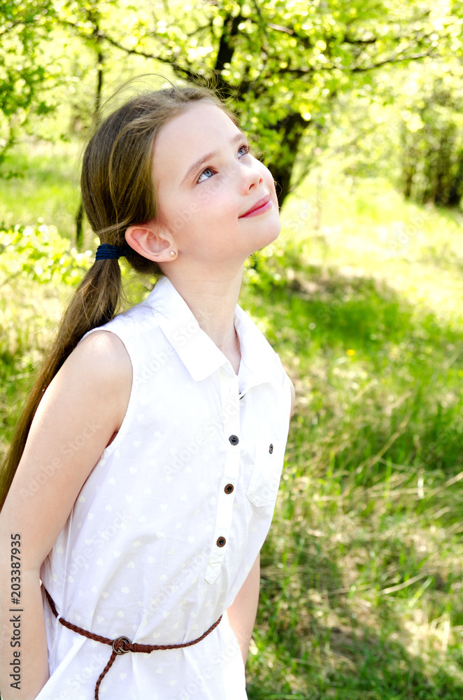 Portrait of adorable smiling little girl outdoors Portrait of adorable smiling little girl outdoors