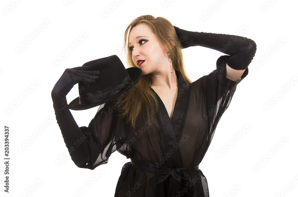 Beautiful young girl in black tunic, black hat and black gloves. Beautiful young girl in black tunic, black hat and black gloves.