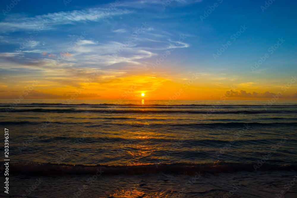 Beautiful sunrise over the tropical beach Beautiful sunrise over the tropical beach