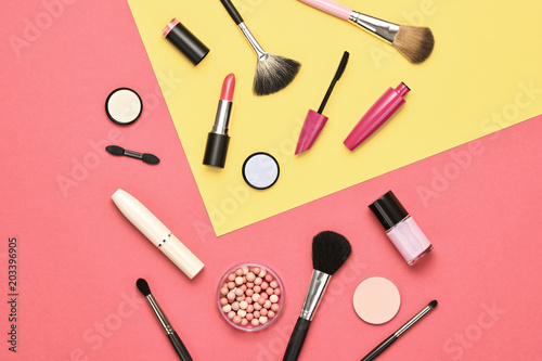 Fashion Cosmetic Makeup Set. Essentials. Layout. Lipstick Brushes Eyeshadow. Woman Beauty Accessories. Trendy Design. Creative Pastel Pink Yellow Color. Art Concept Style. Flat lay.