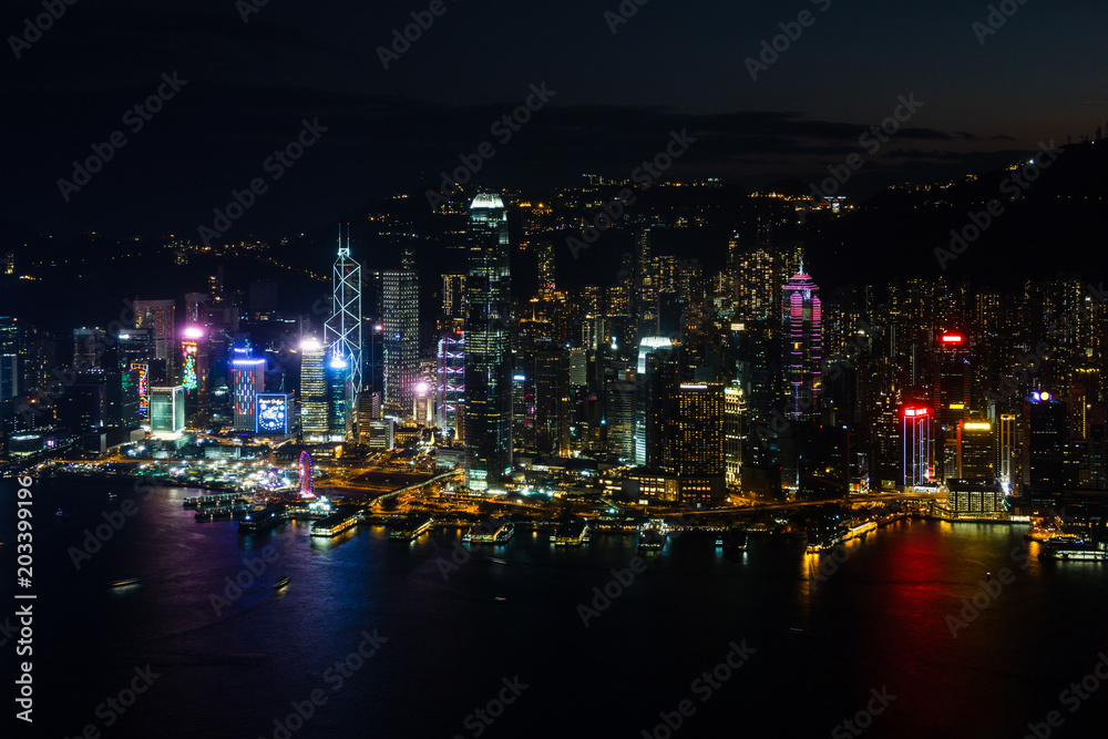 Aerial view on illuminated Hong Kong island at night