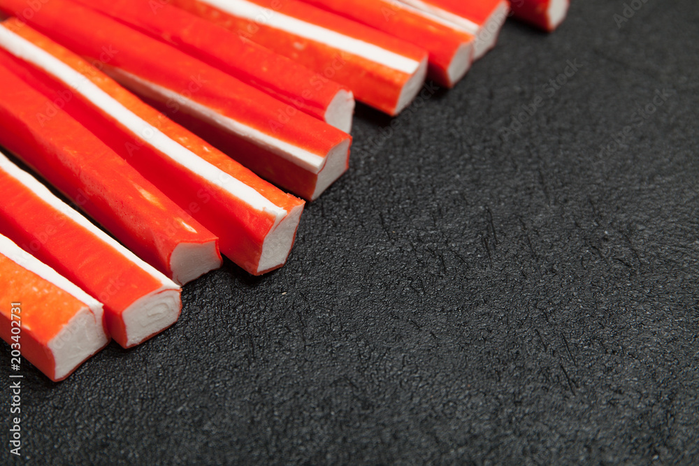 Surimi appetizer, albumen imitation crab sticks. Copy space for text.
