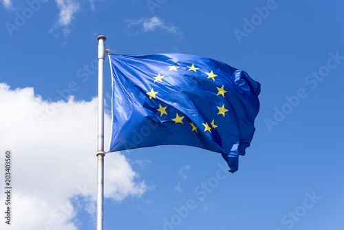 EU Flag waving against blue Sky