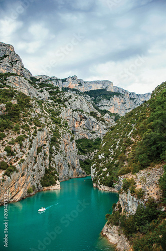 Fototapeta Naklejka Na Ścianę i Meble -  Cliffs on the Verdon River on cloudy day, the river flows into the Lake of Sainte-Croix in the Verdon National Park. In Alpes-de-Haute-Provence department, Provence region, southeastern France