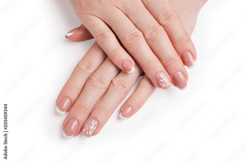 Stylish manicure. Hands of a woman on a white background. Closeup