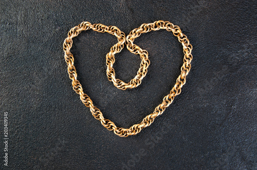 Vintage wooden necklace on black background
