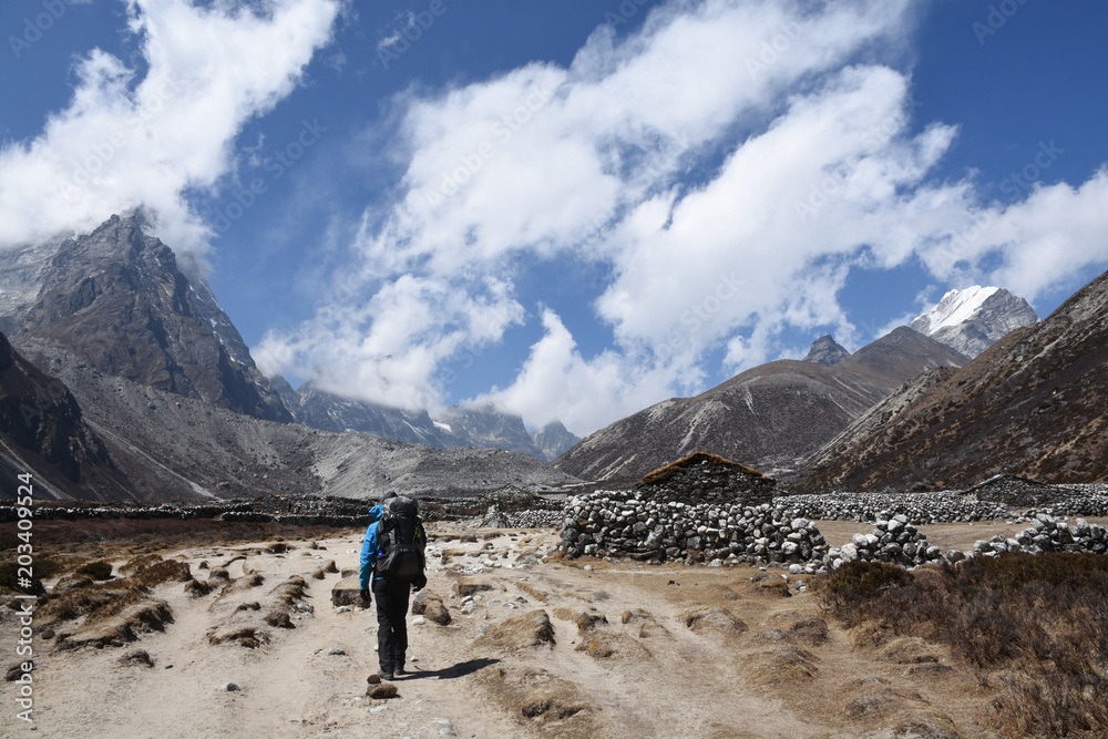 Trekker on the Everest Base Camp Trek in Pheriche Valley, Nepal