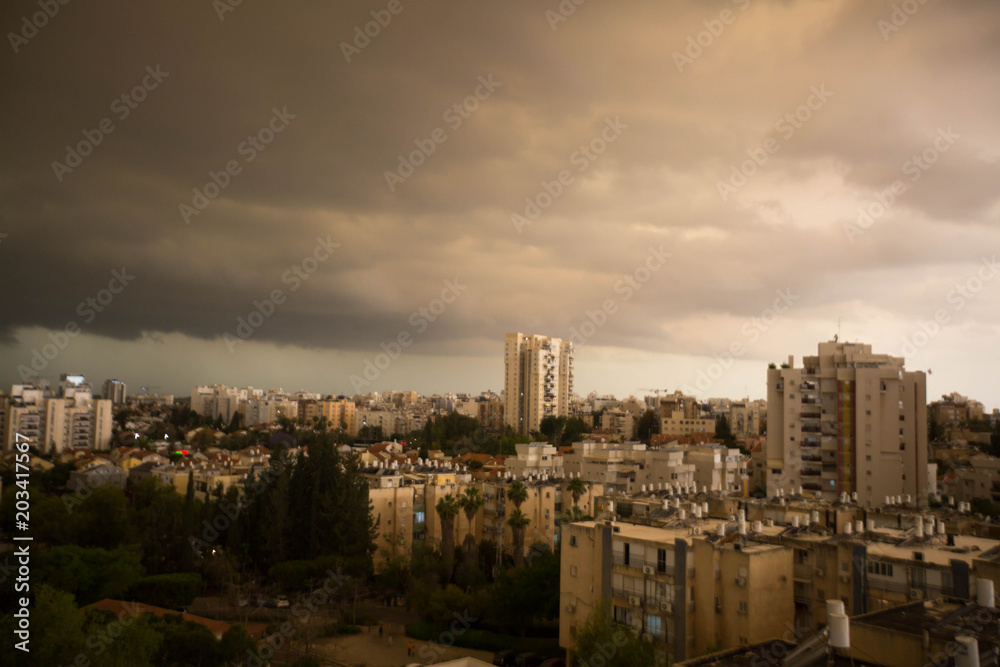 RISHON LE ZION, ISRAEL -APRIL 25, 2018: Dark clouds asperatus before the storm over the city