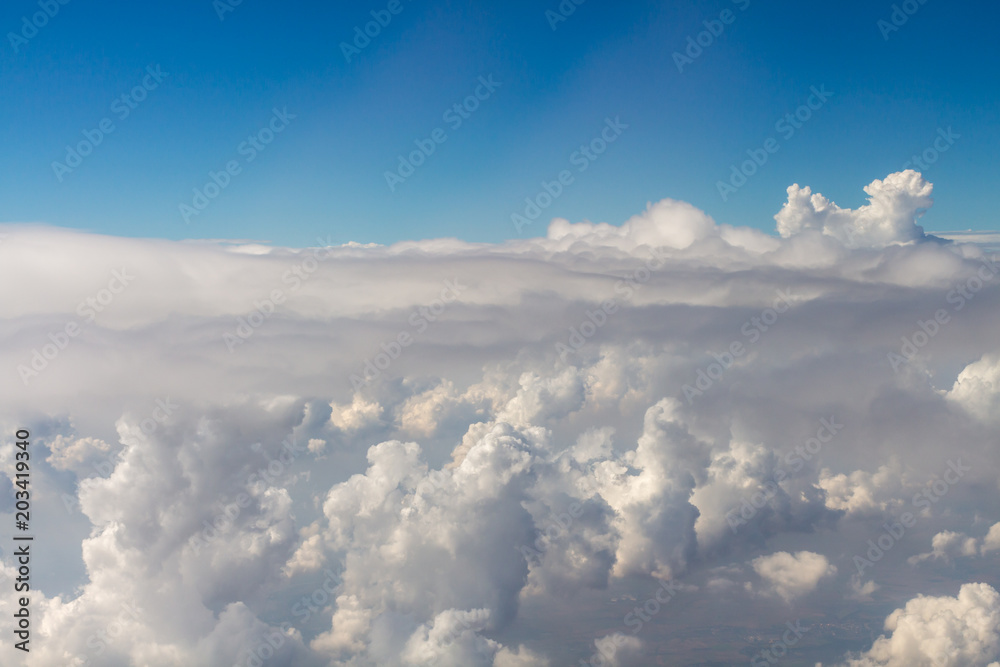 View above the clouds from air plane.