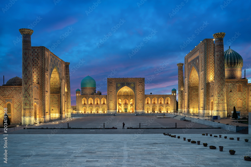 Samarkand at dusk. Historic Registan square with three madrasahs: Ulugh Beg, Tilya-Kori and Sher-Dor
