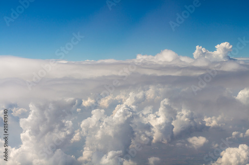 View above the clouds from air plane.