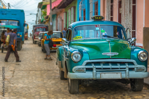 Green vintage car in Trinidad, Cuba  © Christian Schmidt 