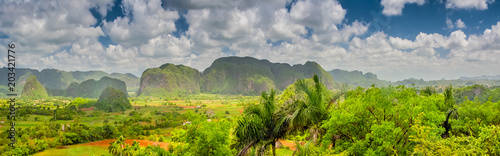 Panorama shot of the Viñales Valley with the Sierra de los Organos mountains in the background photo