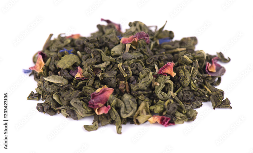Green tea with dry flowers on white background. Close up. Green tea with dry flowers on white background. Close up.
