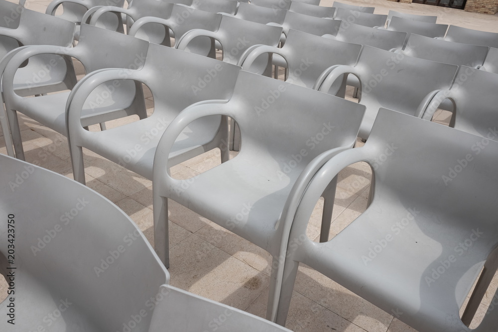 Naklejka premium empty auditorium chairs outdoors