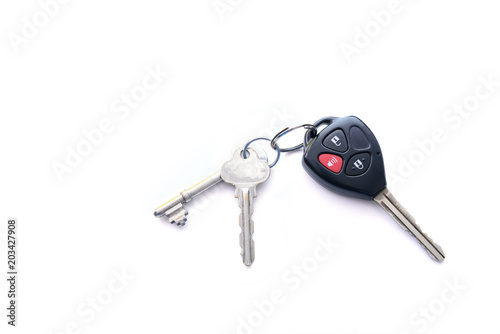 Black Remote car and house silver keys isolated on white background