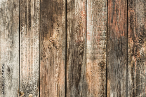 the wood texture, old wall of rough wooden panels, close-up abstract background