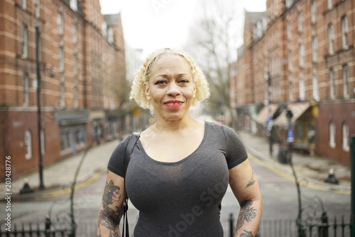 Portrait of a mixed race woman in an urban street photo