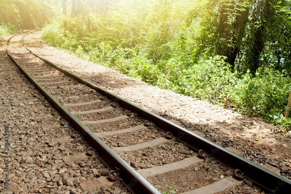 Railroad tracks near the cliff of history from World War 2 at Death Railway Kanchanaburi Province Thailand. Railroad tracks near the cliff of history from World War 2 at Death Railway Kanchanaburi Province Thailand.