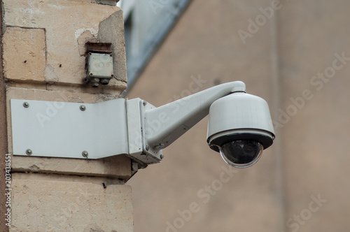 closeup of security camera in the city