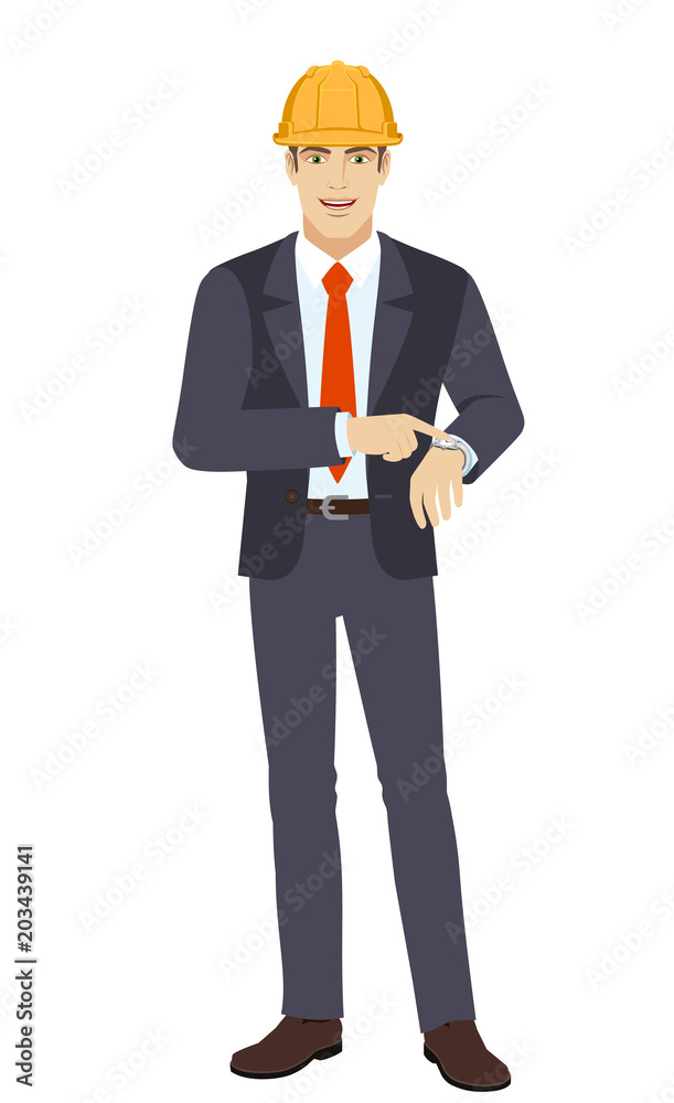 Businesswoman in construction helmet pointing at his watch Businesswoman in construction helmet pointing at his watch