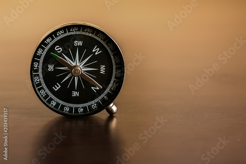 Compass on wood table