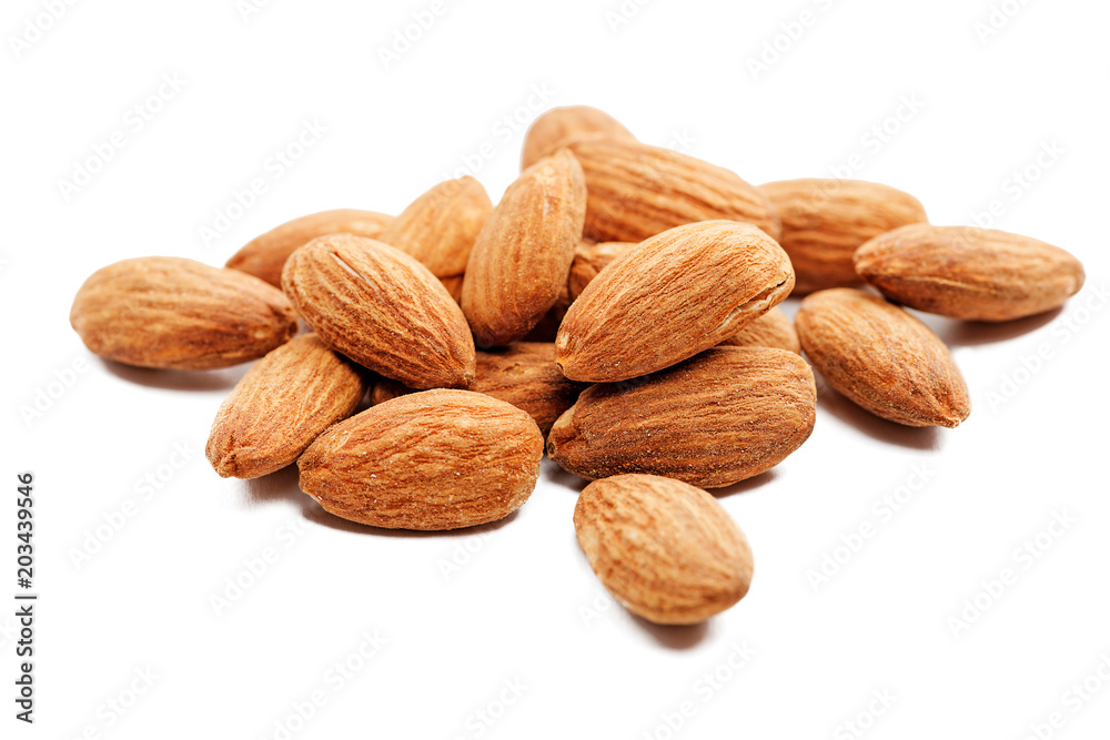Group of almonds isolated on white. Group of almonds isolated on white.