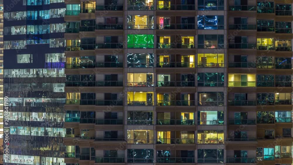 Scenic glowing windows of skyscrapers at evening timelapse Scenic glowing windows of skyscrapers at evening timelapse