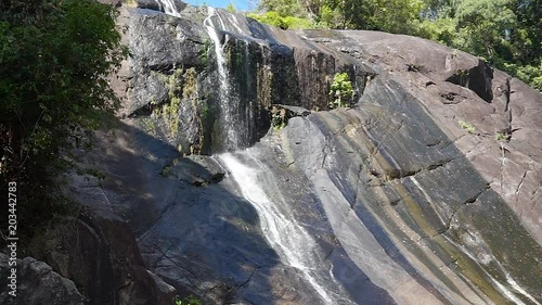 Seven wells waterfall in rocky mountains on tropical island Langkawi, Malaysia. photo