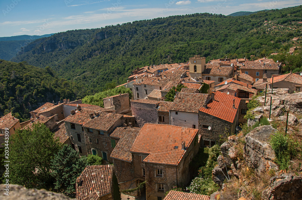 Panoramic view of houses and roofs of the village of Chateaudouble, a quiet and tourist village with medieval origin on a sunny day. Located in the Var department, Provence region, southeastern France