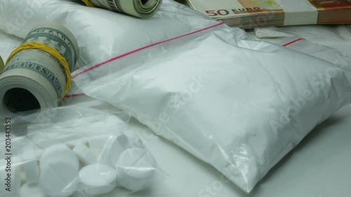 illegal dirty profit of the drug cartel from the sale of cocaine and narcotic tablets.