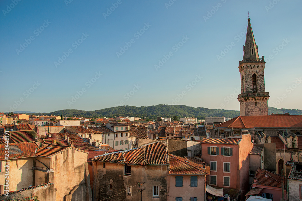 View of the lively and gracious town of Draguignan from the hill of the clock tower, under the colorful light of the sunset. Located in the Var department, Provence region, southeastern France