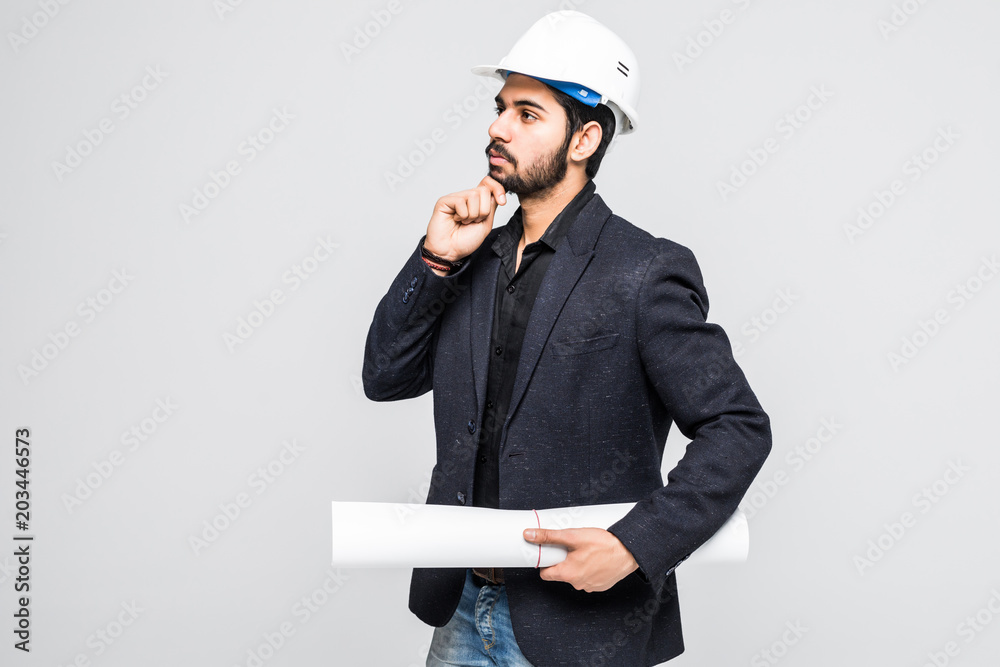 Indian Architect holding blueprints isolated on white background. Indian Architect holding blueprints isolated on white background.