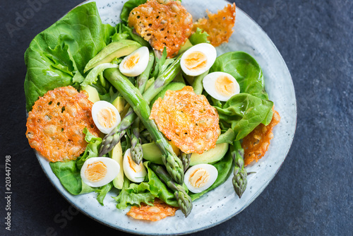 Asparagus Salad with quails eggs and cheese crisps