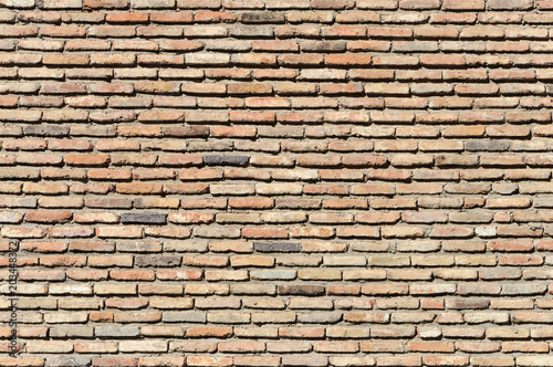 Old brown brick wall background