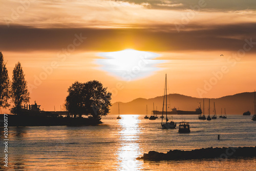 Sunset at Sunset Beach in Vancouver, BC, Canada photo